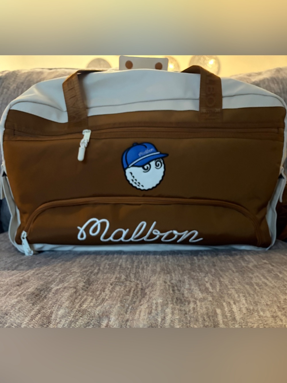 Malbon Travel duffel bag brown w/ separate shoe compartment.